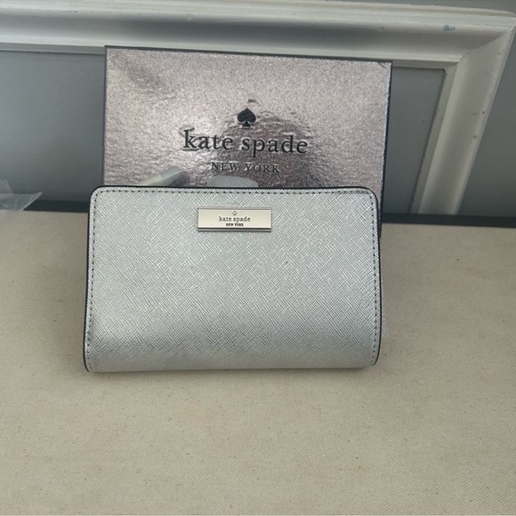 kate spade Handbags - kate spade metallic silver saffiano compact wallet nwt